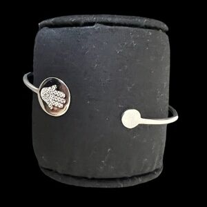 Stainless steel cuff bracelet with a hamsa 🪬 hand